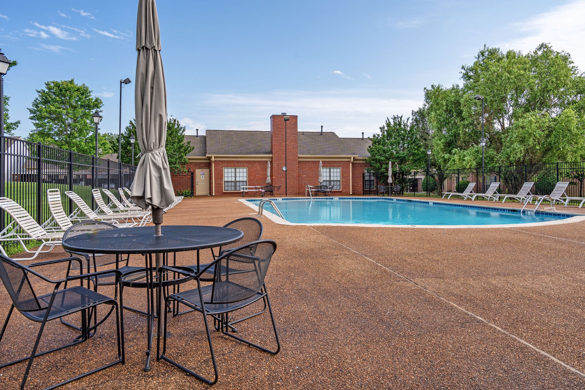 523 General George Patton Road Nashville, TN 37221 - Photo 27 of 30 a table and chairs in front of a house