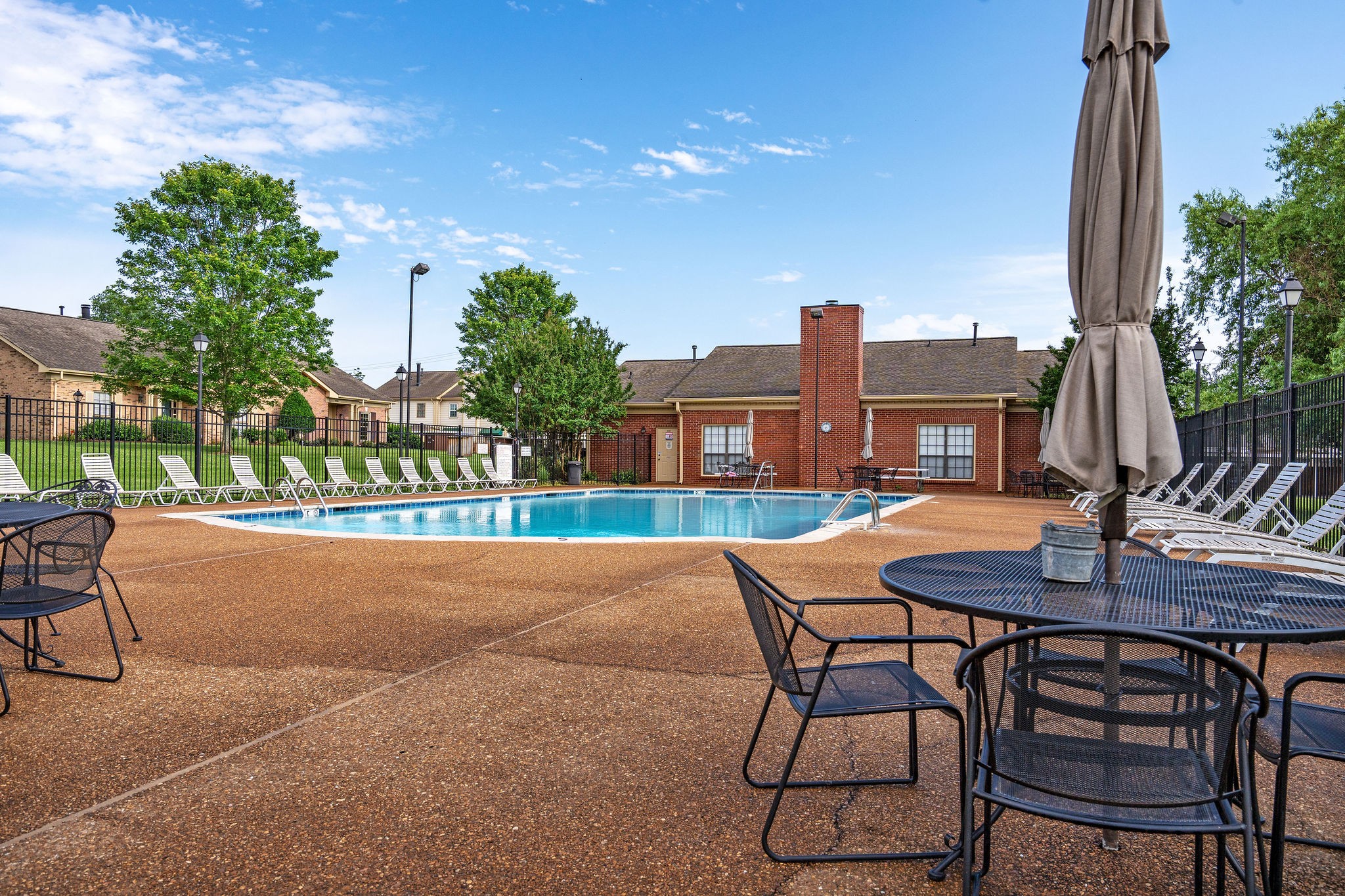 523 General George Patton Road Nashville, TN 37221 - Photo 28 of 30 a patio with a table and chairs and potted plants