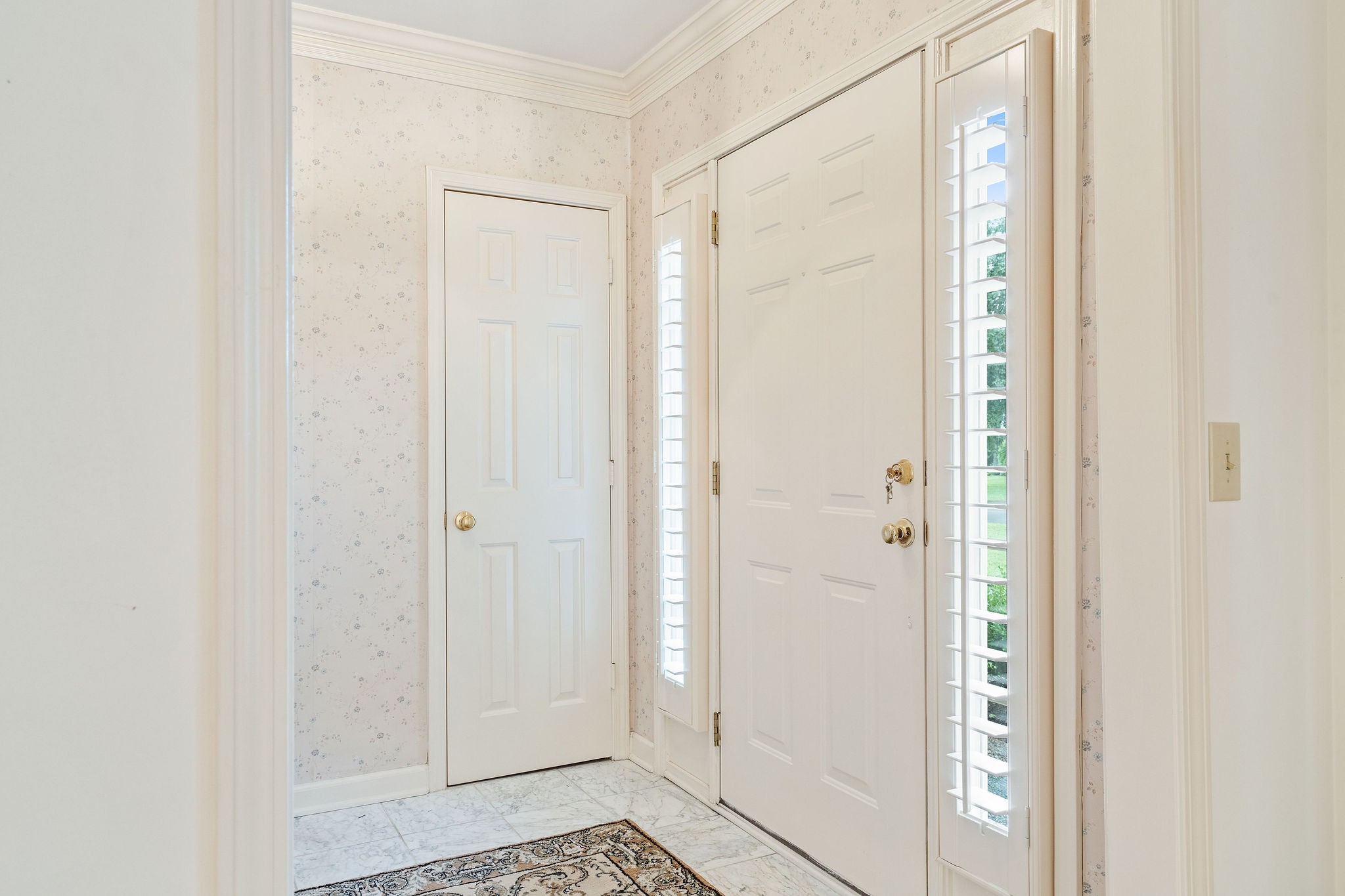 523 General George Patton Road Nashville, TN 37221 - Photo 3 of 30 a bathroom with a glass shower door