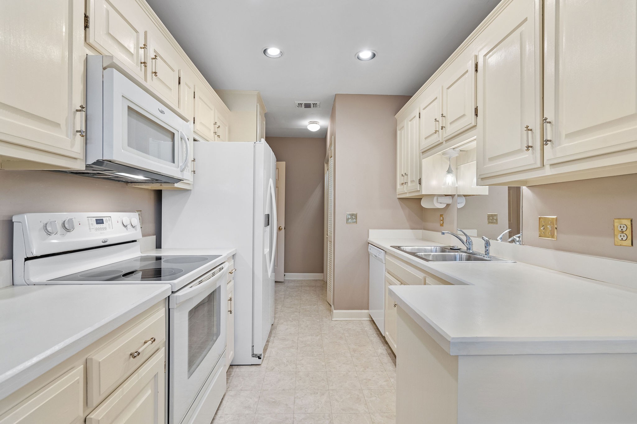 523 General George Patton Road Nashville, TN 37221 - Photo 10 of 30 a kitchen with cabinets and stainless steel appliances