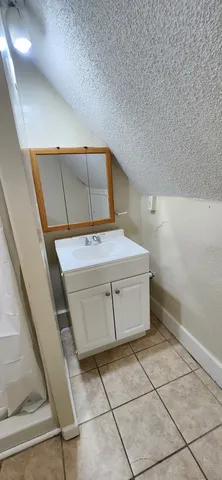 a utility room with cabinets