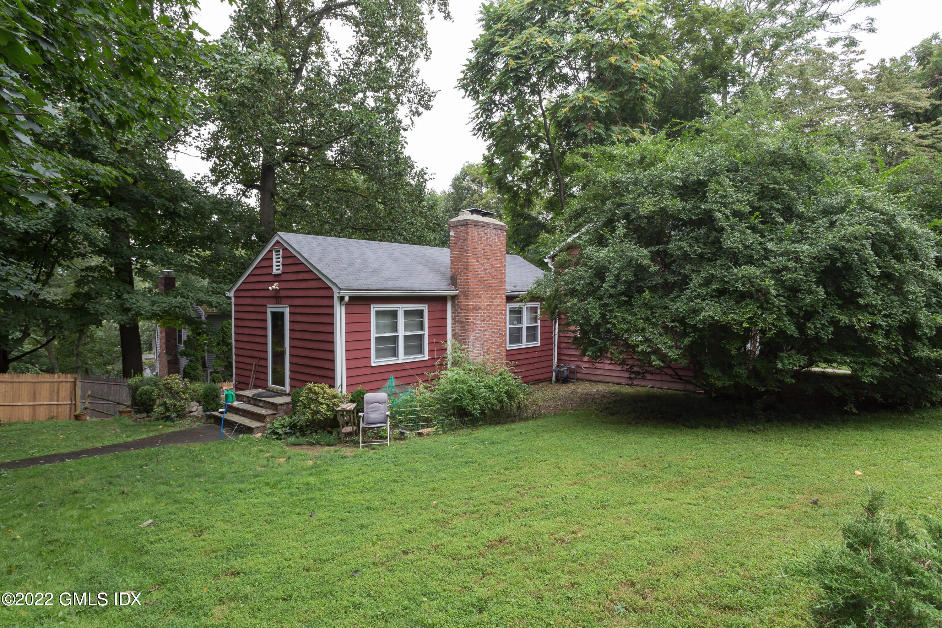 112 Sheep Hill Road Riverside, CT 06878 - Photo 6 of 7 a view of a house with garden