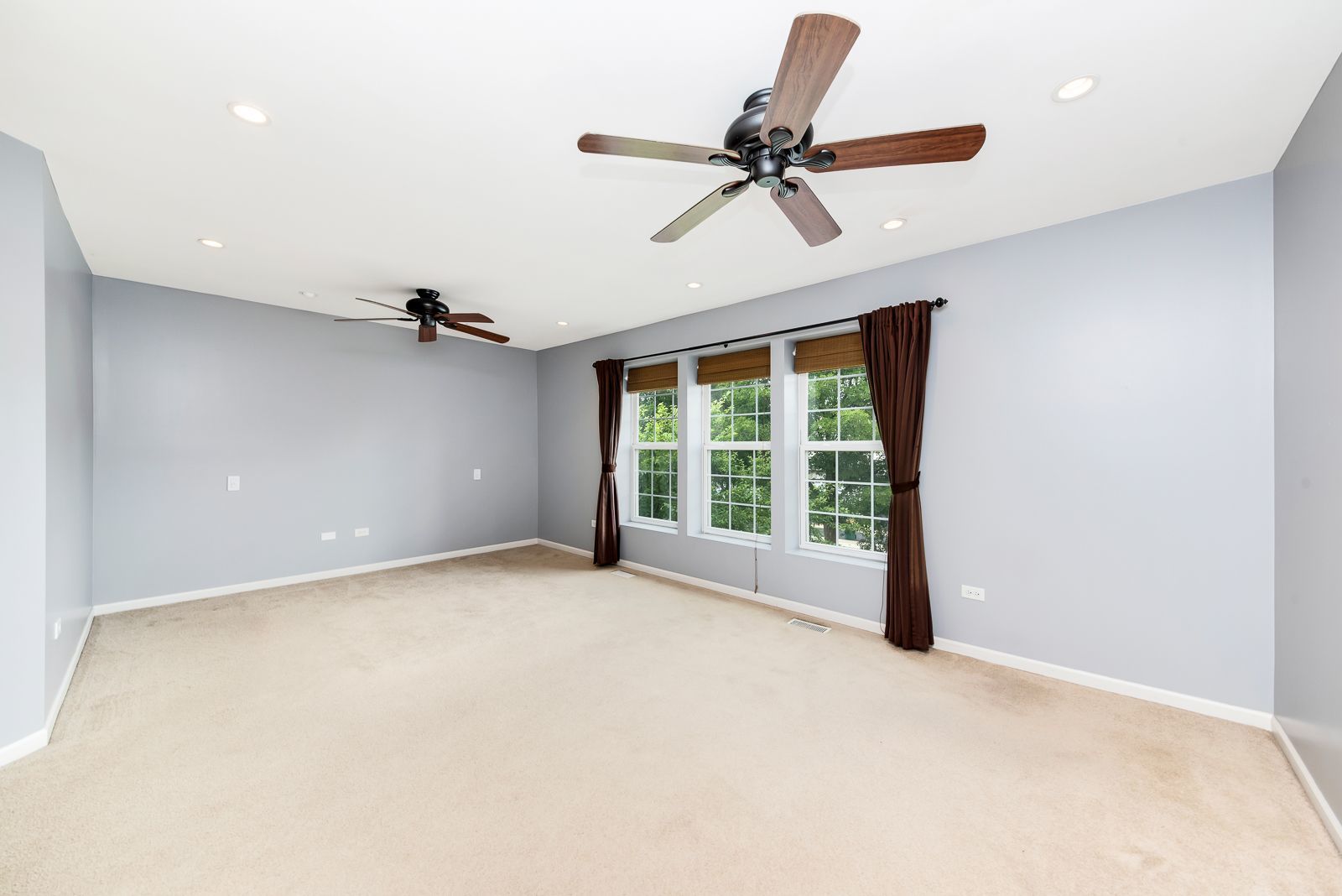 15305 Pinewood Road, Unit 15305 Lockport, IL 60441 - Photo 12 of 19 a view of an empty room with a window