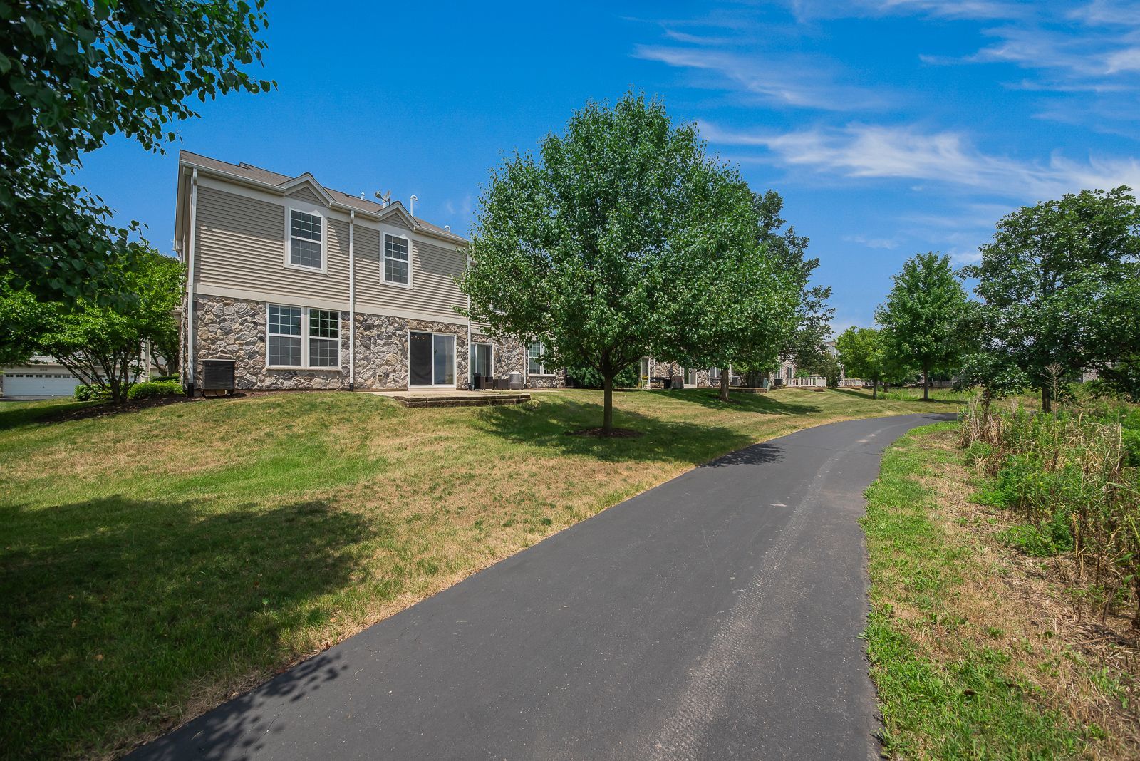 15305 Pinewood Road, Unit 15305 Lockport, IL 60441 - Photo 19 of 19 a view of a house with a yard