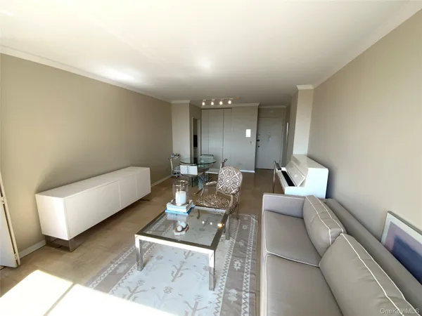 a living room with furniture and a couch
