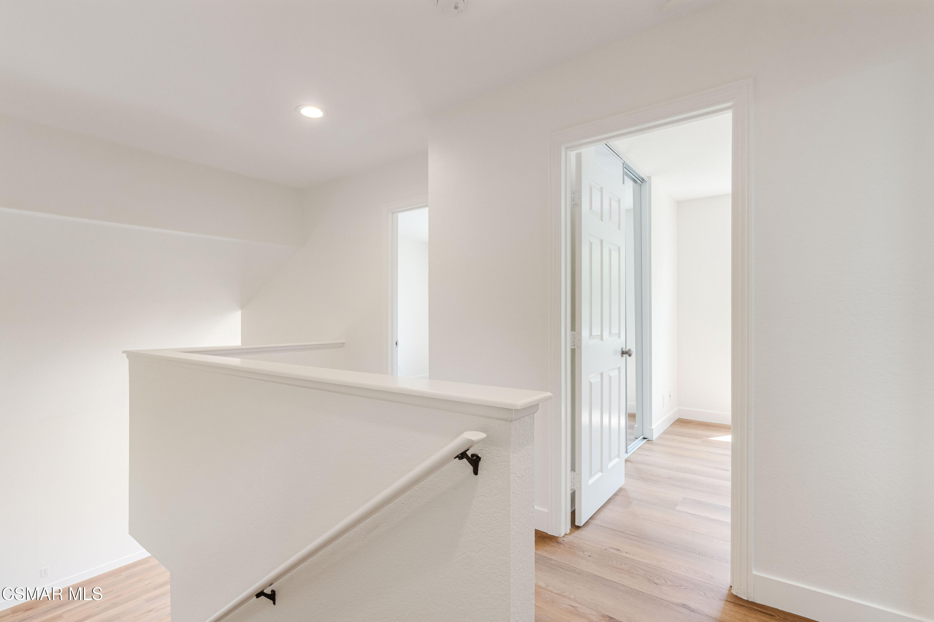 2332 Hampton Avenue Simi Valley, CA 93063 - Photo 22 of 34 a view of a hallway with wooden floor