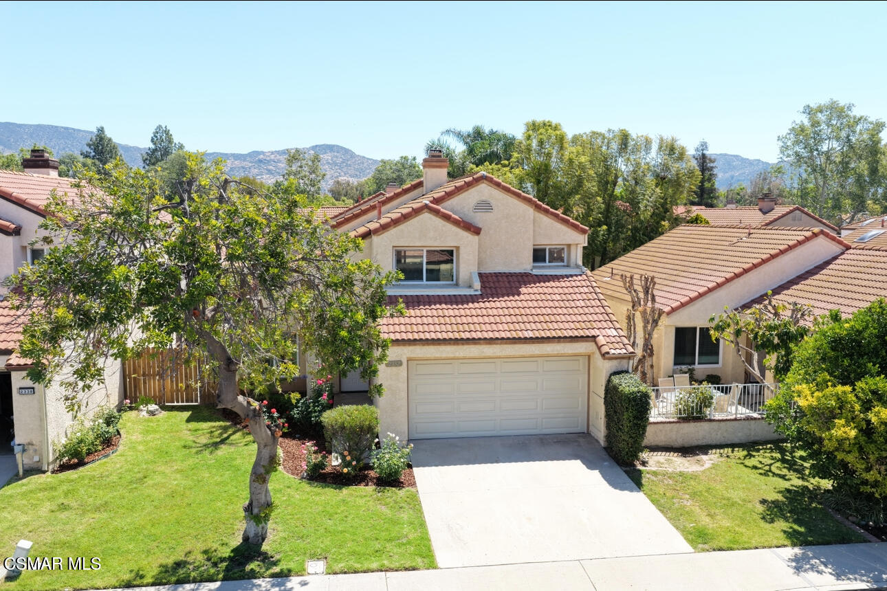 2332 Hampton Avenue Simi Valley, CA 93063 - Photo 34 of 34 a front view of a house with a yard
