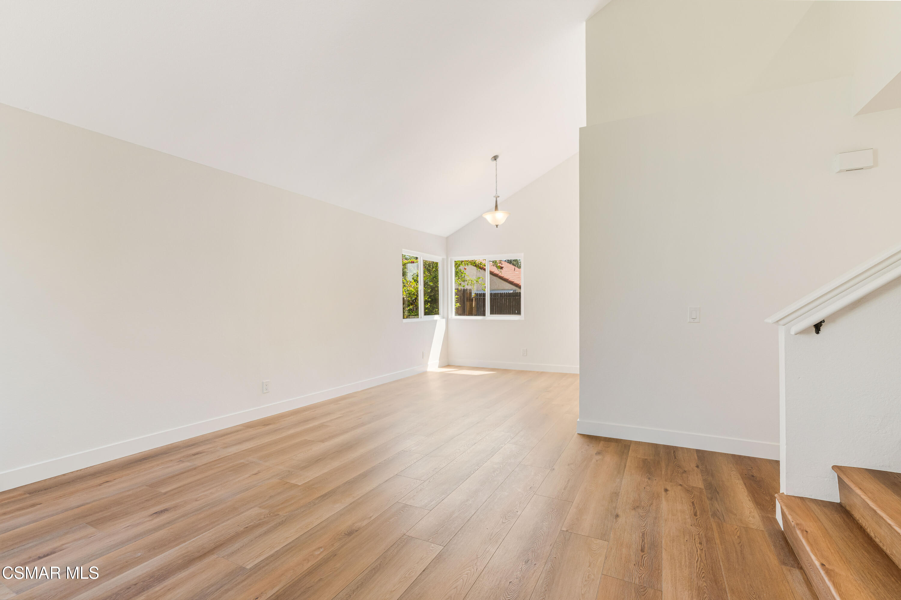 2332 Hampton Avenue Simi Valley, CA 93063 - Photo 4 of 34 an empty room with wooden floor and windows