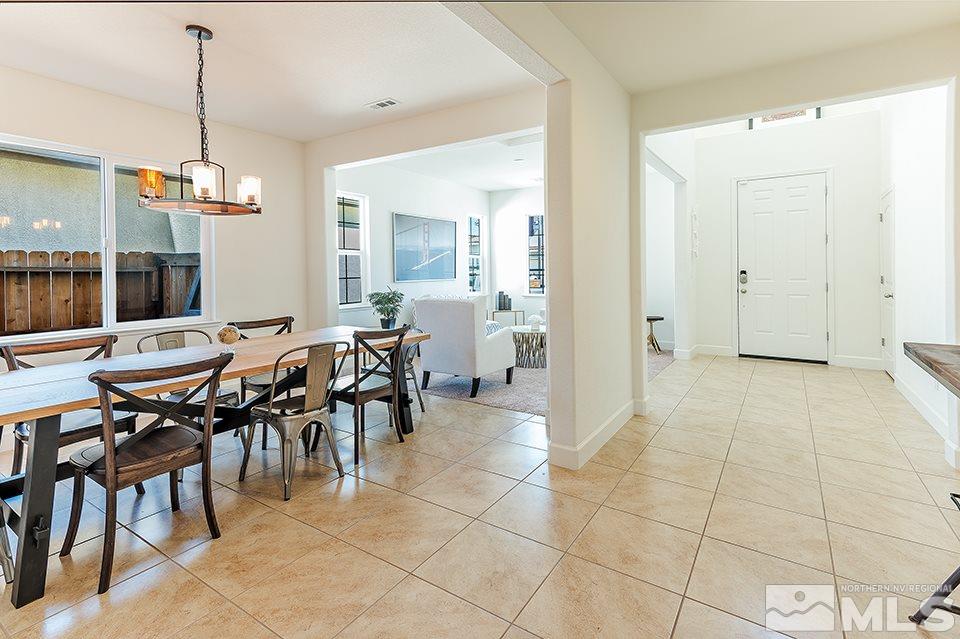 2076 Long Meadow Drive Reno, NV 89521 - Photo 4 of 21 a view of a dining area with furniture