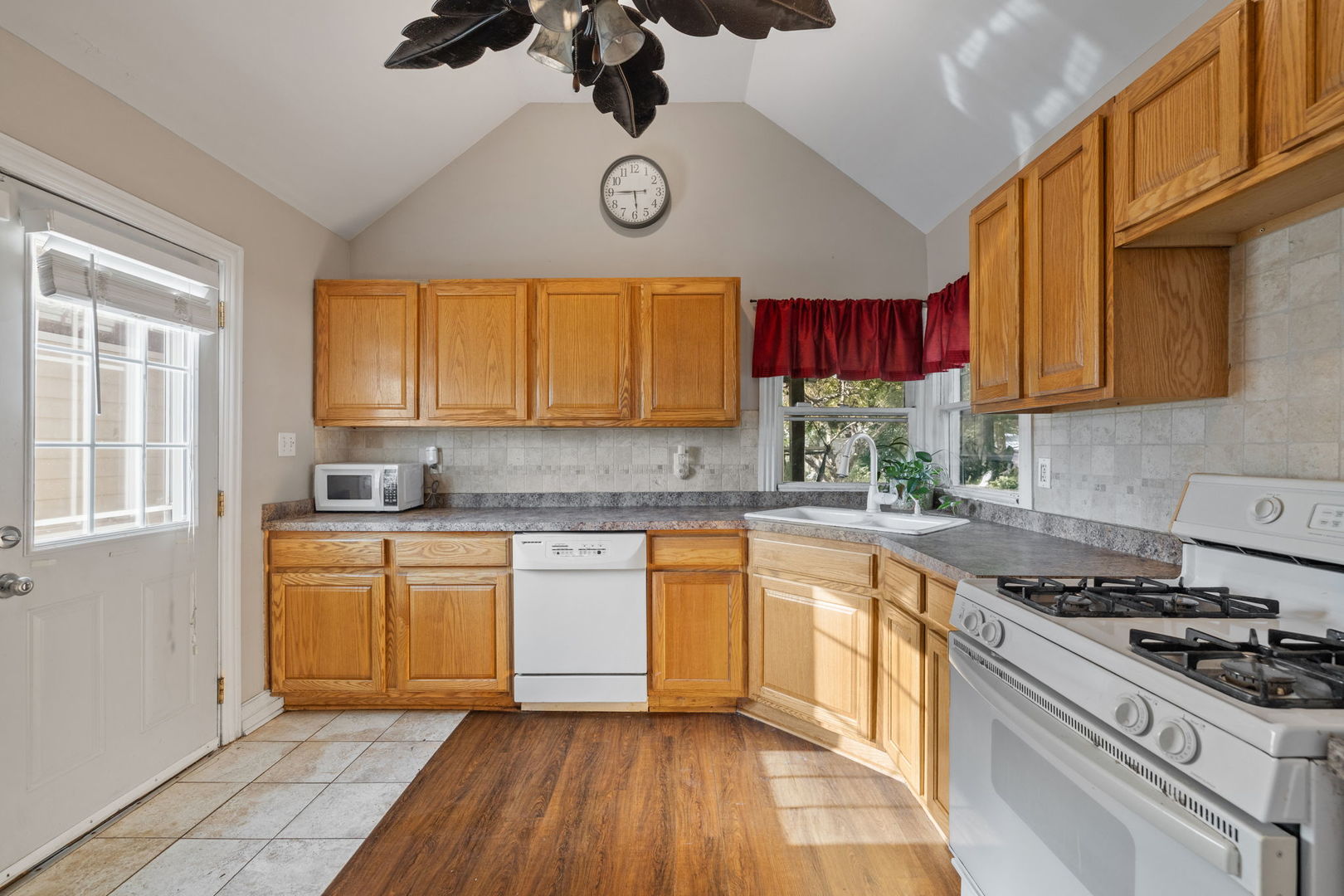 600 Bruce Road Lockport, IL 60441 - Photo 11 of 23 a kitchen with stainless steel appliances granite countertop a stove and a sink