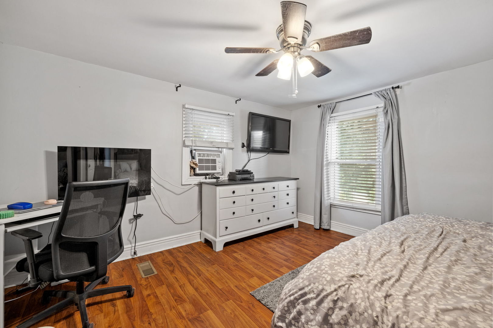 600 Bruce Road Lockport, IL 60441 - Photo 15 of 23 a bedroom with a bed dresser and a window