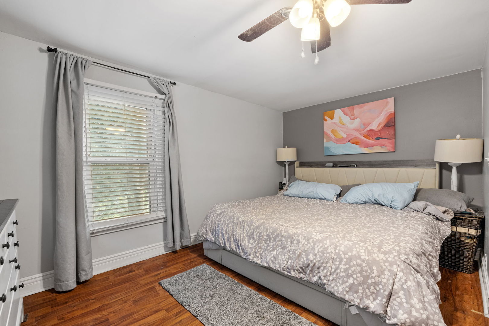 600 Bruce Road Lockport, IL 60441 - Photo 16 of 23 a bedroom with a bed and a painting on the wall