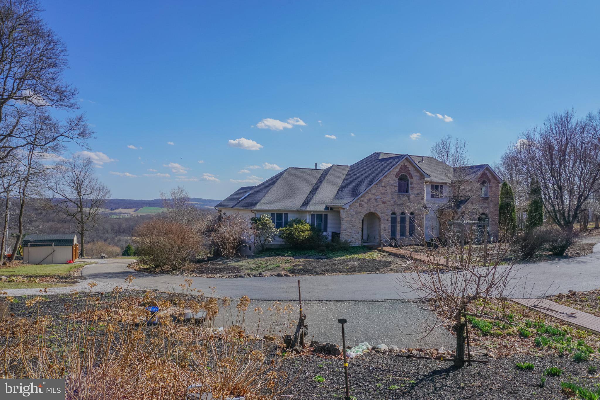 4815 Zeiglers Church Road Spring Grove, PA 17362 - Photo 108 of 126 a view of a big house with a big yard and large trees