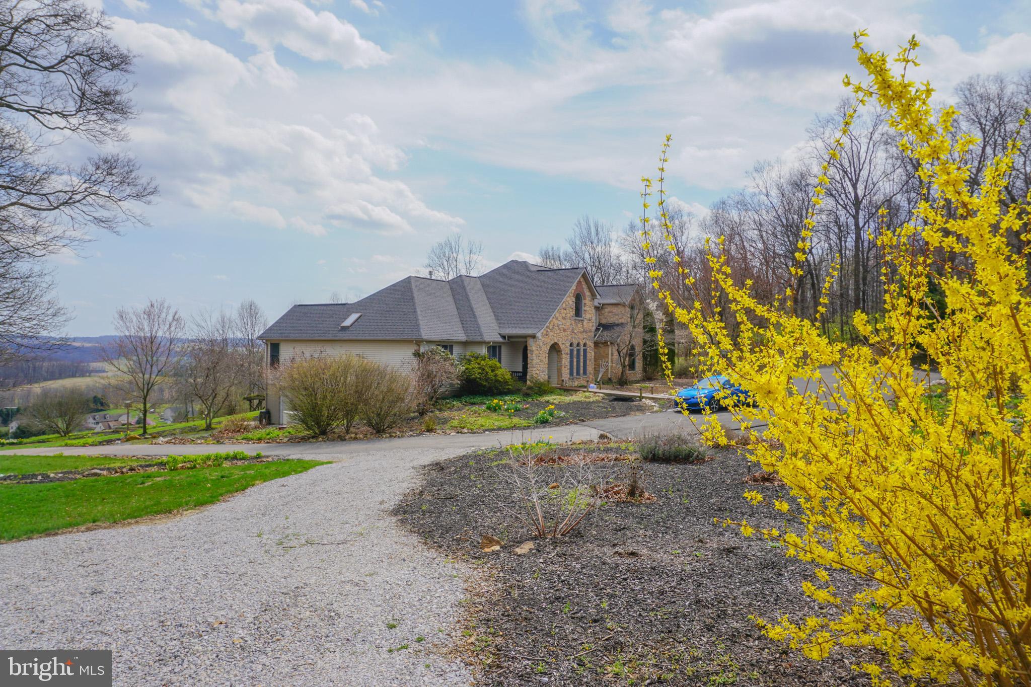 4815 Zeiglers Church Road Spring Grove, PA 17362 - Photo 14 of 126 a view of a house with a yard and pathway