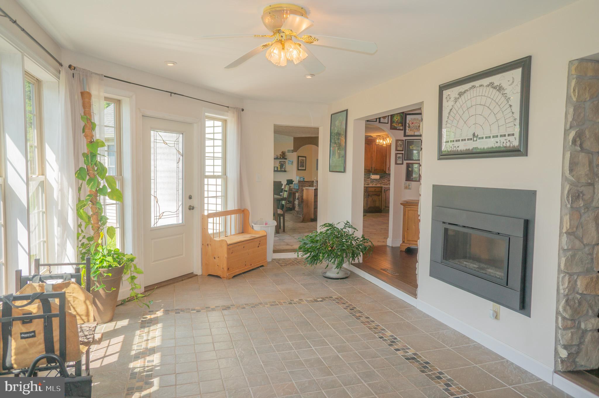 4815 Zeiglers Church Road Spring Grove, PA 17362 - Photo 30 of 126 a living room with furniture and a fireplace