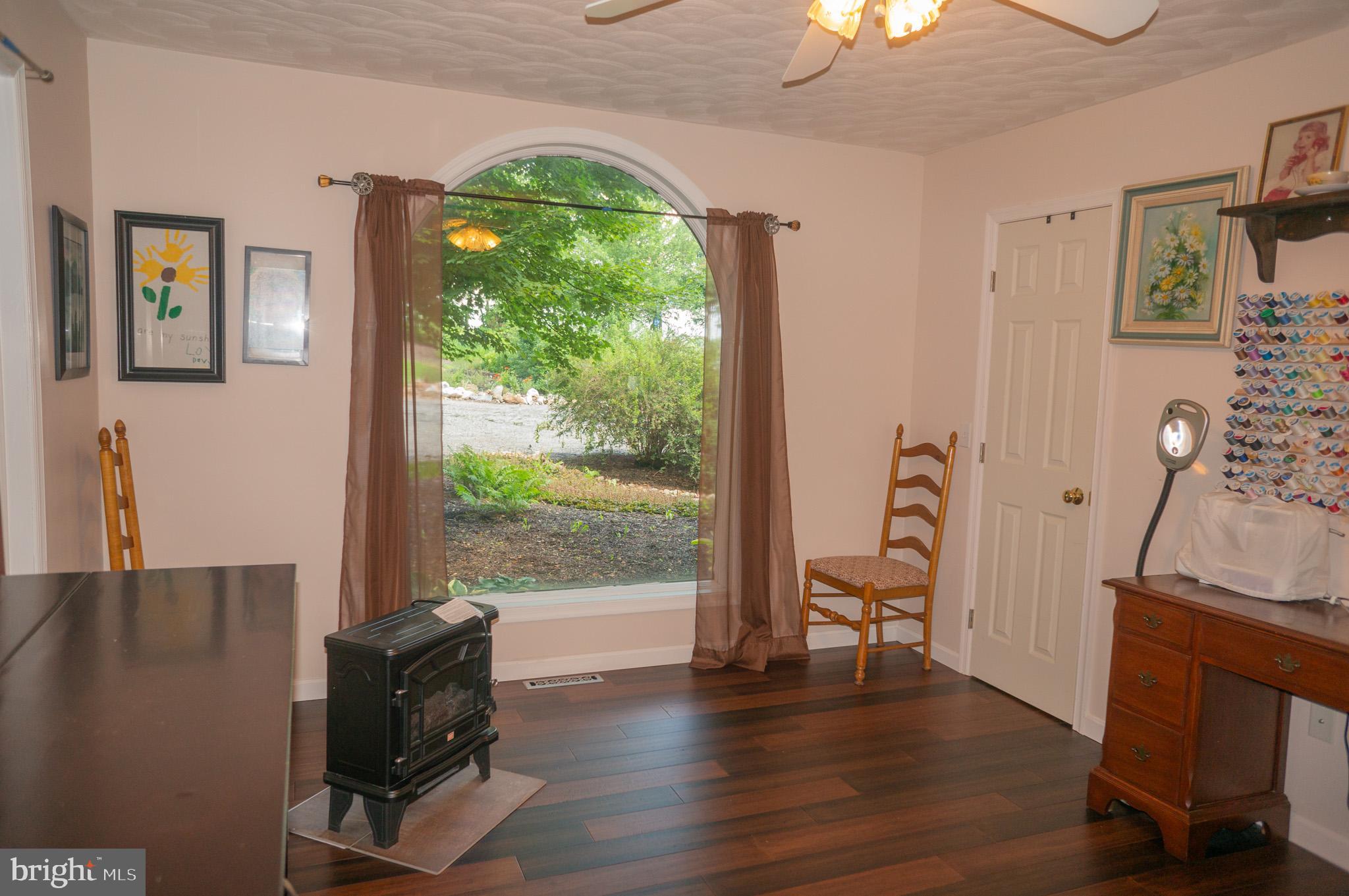 4815 Zeiglers Church Road Spring Grove, PA 17362 - Photo 47 of 126 a view of a workspace with furniture and a window