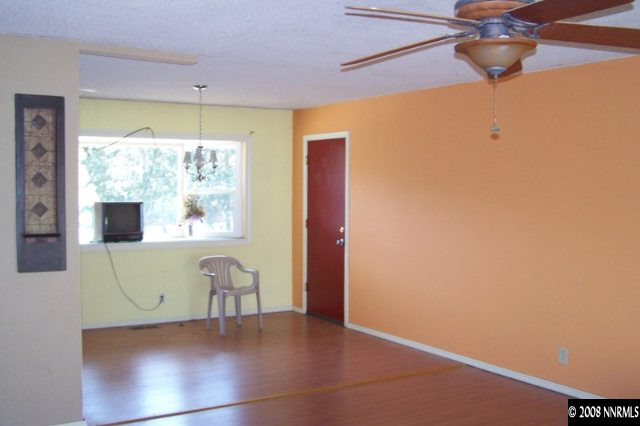 22885 Carriage Drive Reno, NV 89521 - Photo 3 of 5 a view of an empty room with a window