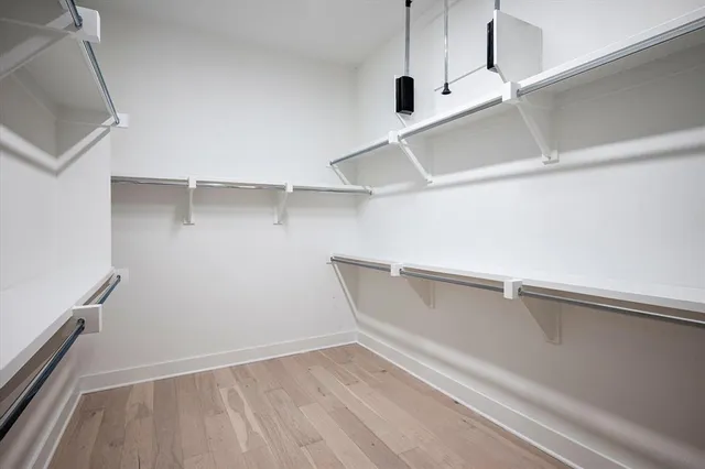 a view of an empty walk in closet