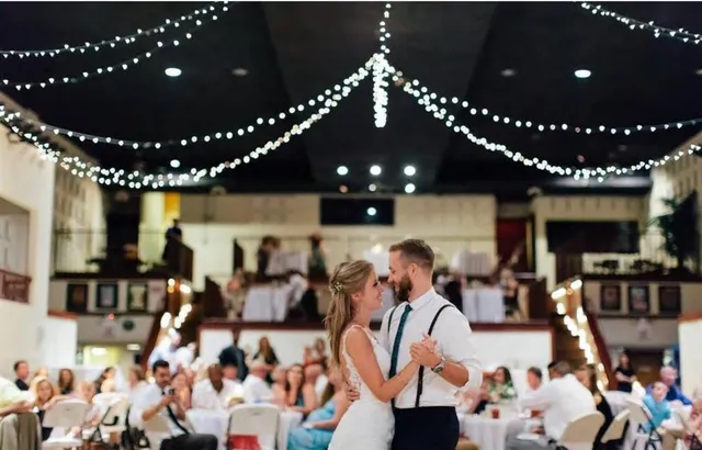 a room with lots of residential furniture and chandelier