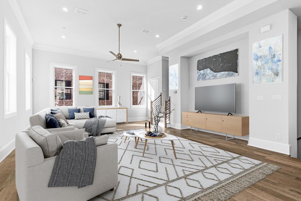 1362 East Crosby Road Carrollton, TX 75006 - Photo 4 of 26 a living room with furniture and a flat screen tv