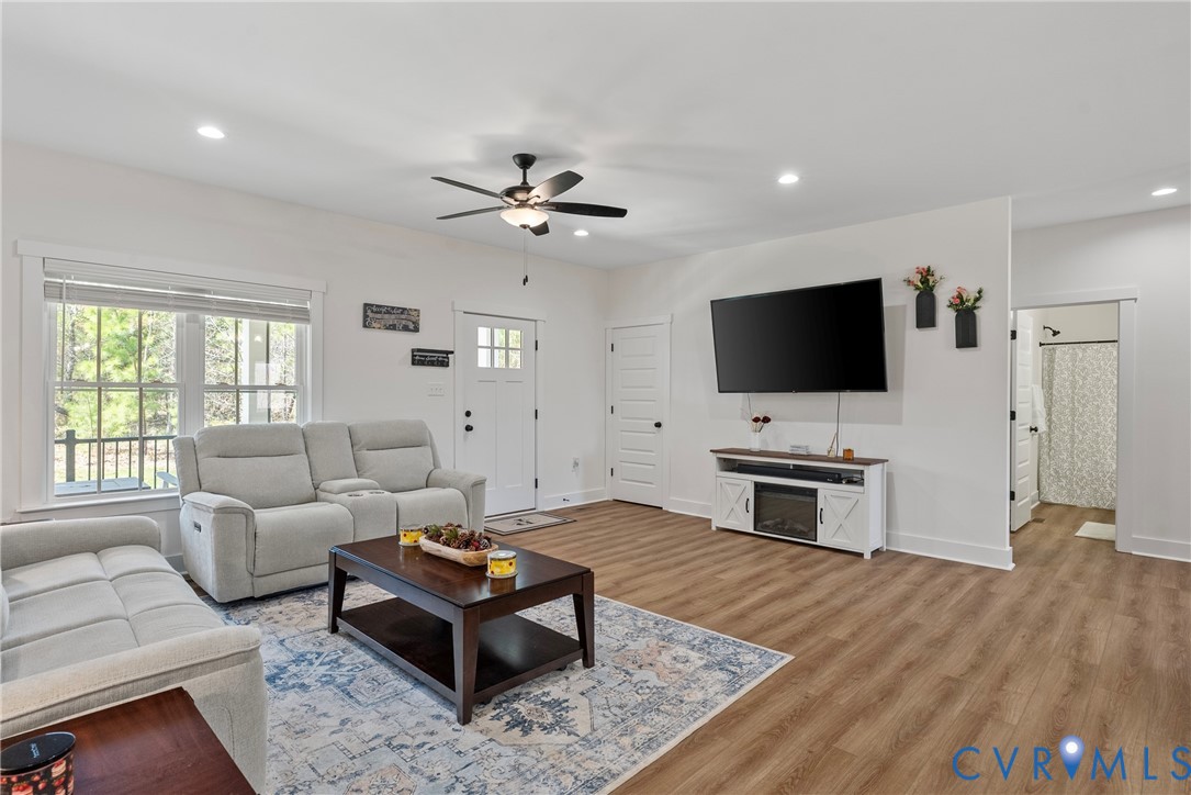 4316 Mt Airy Road Louisa, VA 23093 - Photo 11 of 45 a living room with furniture and a flat screen tv