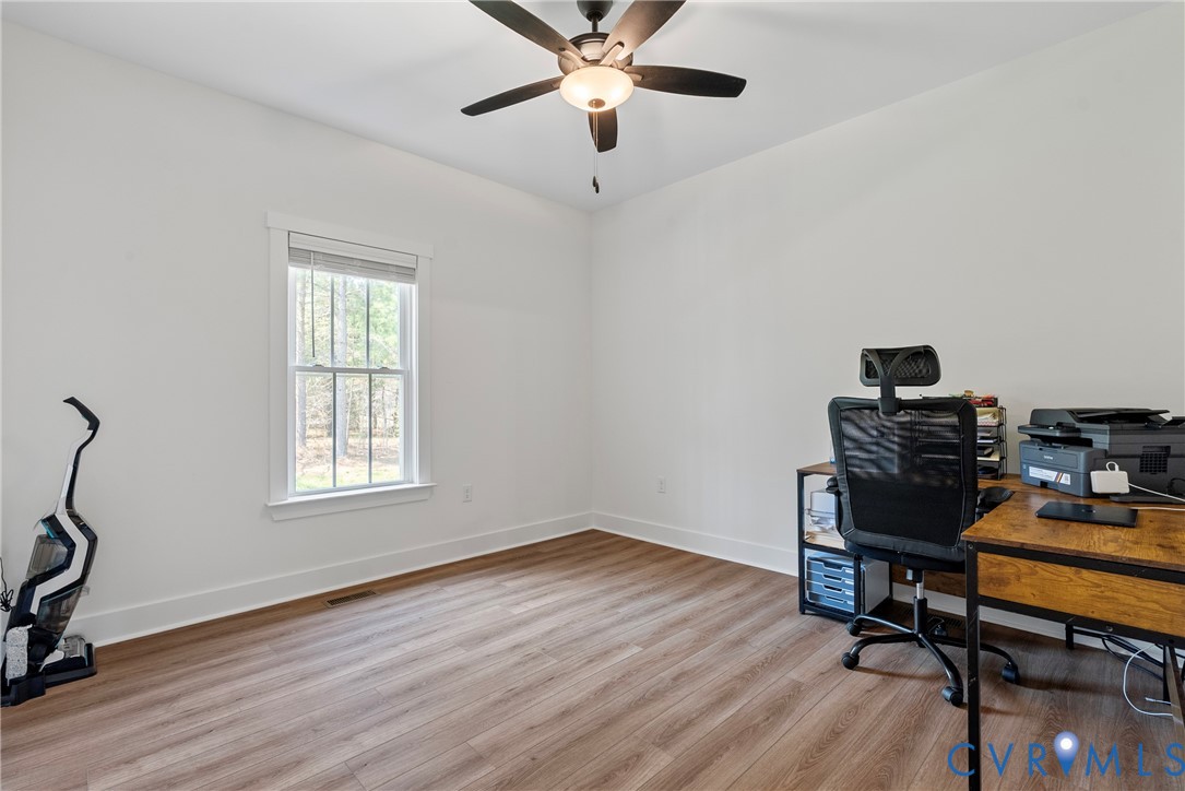 4316 Mt Airy Road Louisa, VA 23093 - Photo 19 of 45 a workspace with wooden floor and windows