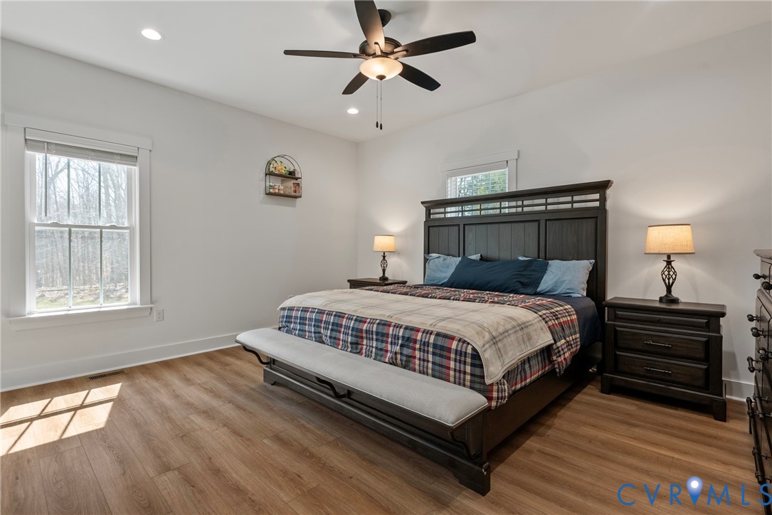 4316 Mt Airy Road Louisa, VA 23093 - Photo 23 of 45 a bedroom with a bed rug and wooden floor