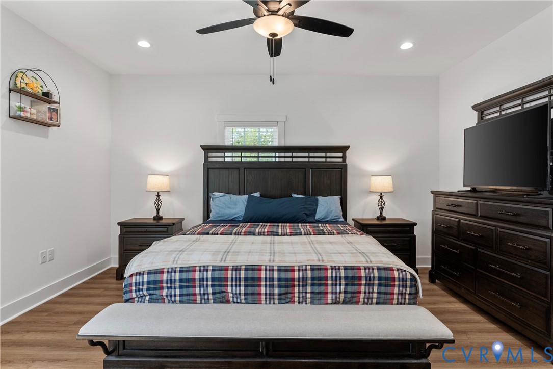4316 Mt Airy Road Louisa, VA 23093 - Photo 24 of 45 a bedroom with a bed and a flat screen tv