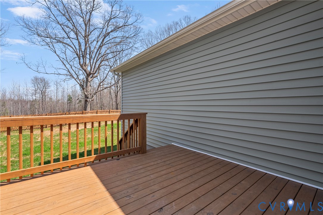 4316 Mt Airy Road Louisa, VA 23093 - Photo 34 of 45 a view of deck with wooden floor and floor to ceiling window