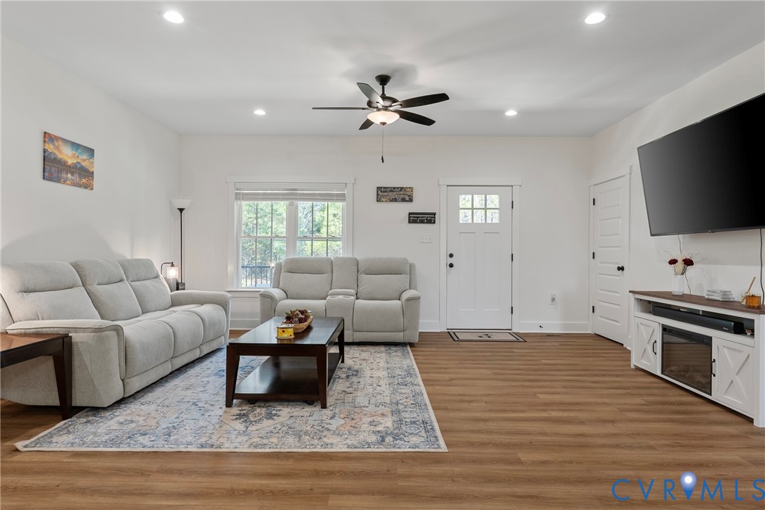 4316 Mt Airy Road Louisa, VA 23093 - Photo 10 of 45 a living room with furniture and a flat screen tv