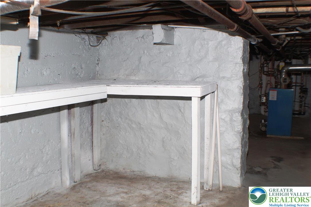 115 Howertown Road Catasauqua, PA 18032 - Photo 33 of 33 Rear area of basement, has the egress stairs to Bilco doors.