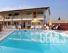 Undisclosed Address Bakersfield, CA 93301 - Photo 25 of 27 a front view of a building with street