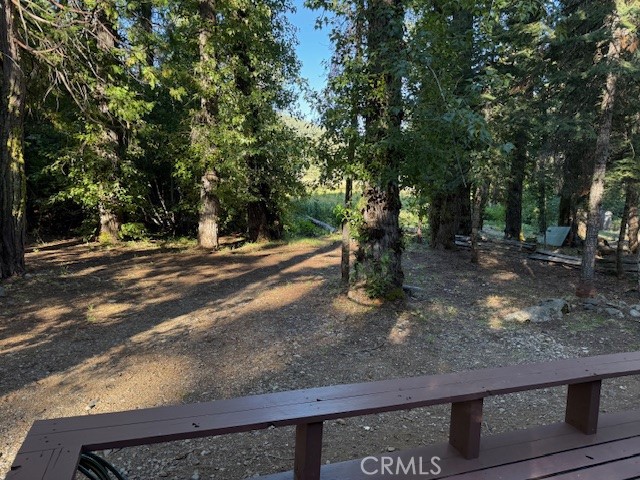 9002 Humboldt Road Forest Ranch, CA 95942 - Photo 7 of 11 a view of a backyard with large trees