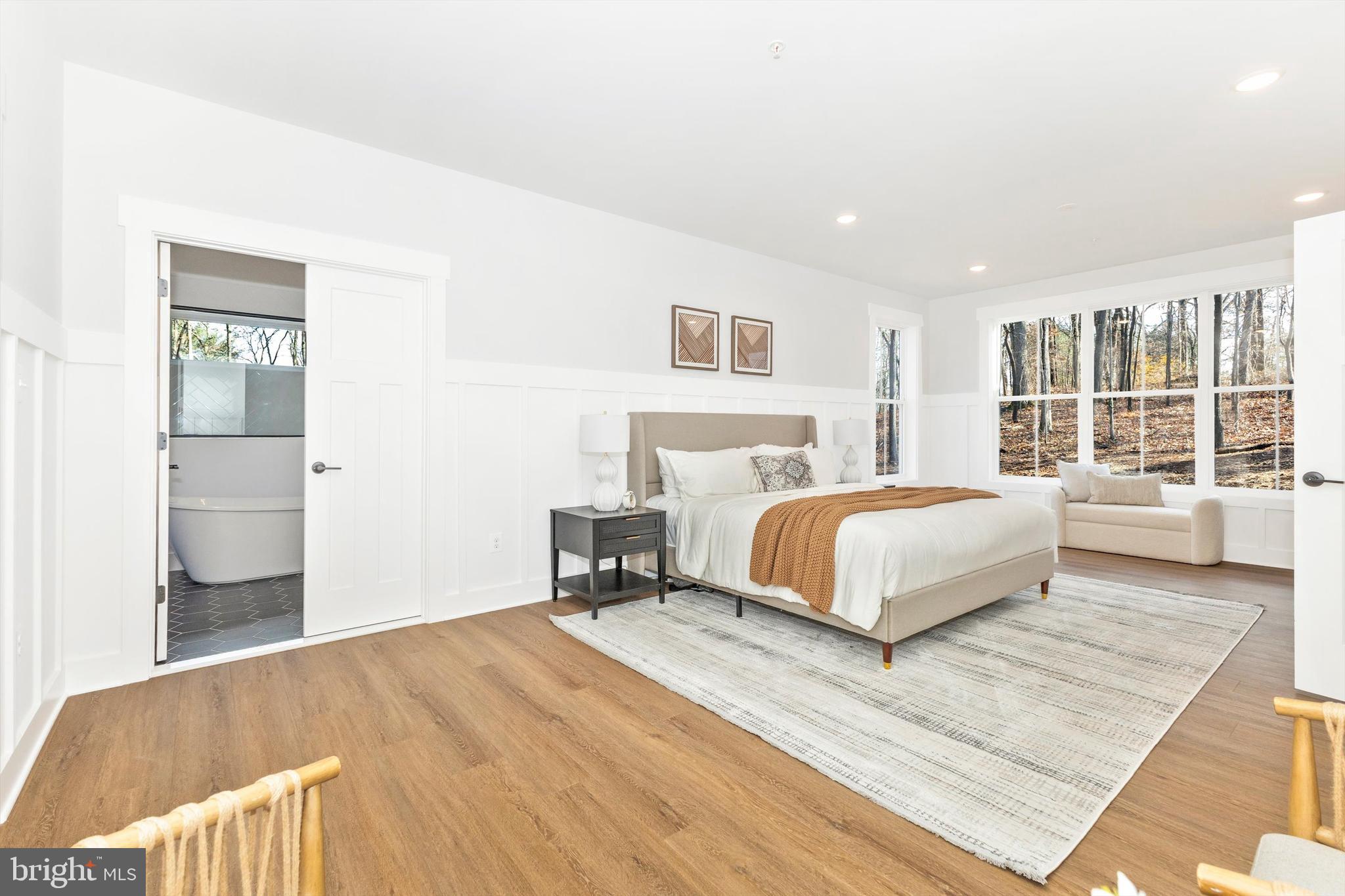 1199 Hoods Mill Road Cooksville, MD 21723 - Photo 27 of 86 a bedroom with a large bed and a large window