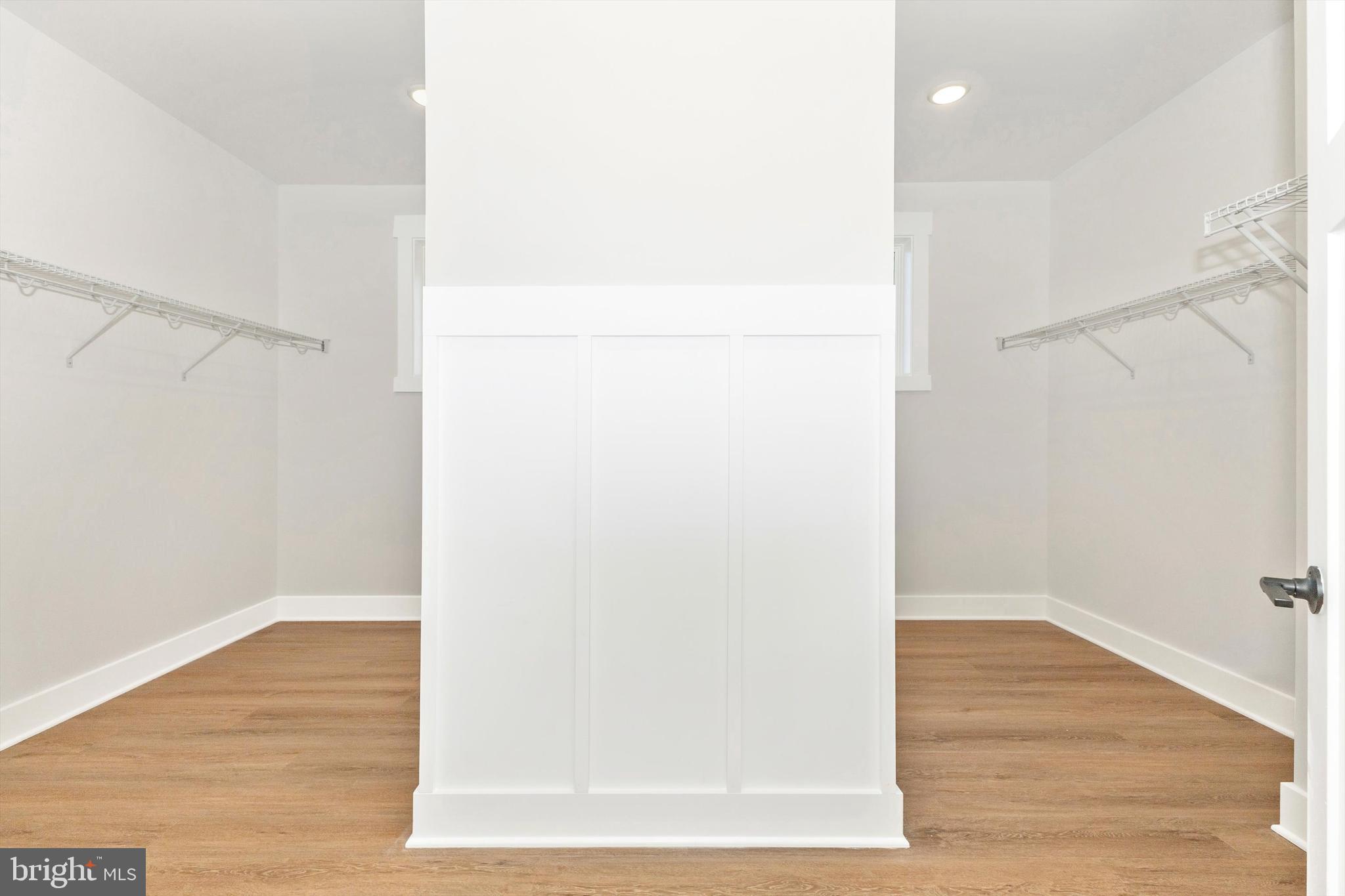 1199 Hoods Mill Road Cooksville, MD 21723 - Photo 35 of 86 a view of walk in closet with wooden floor