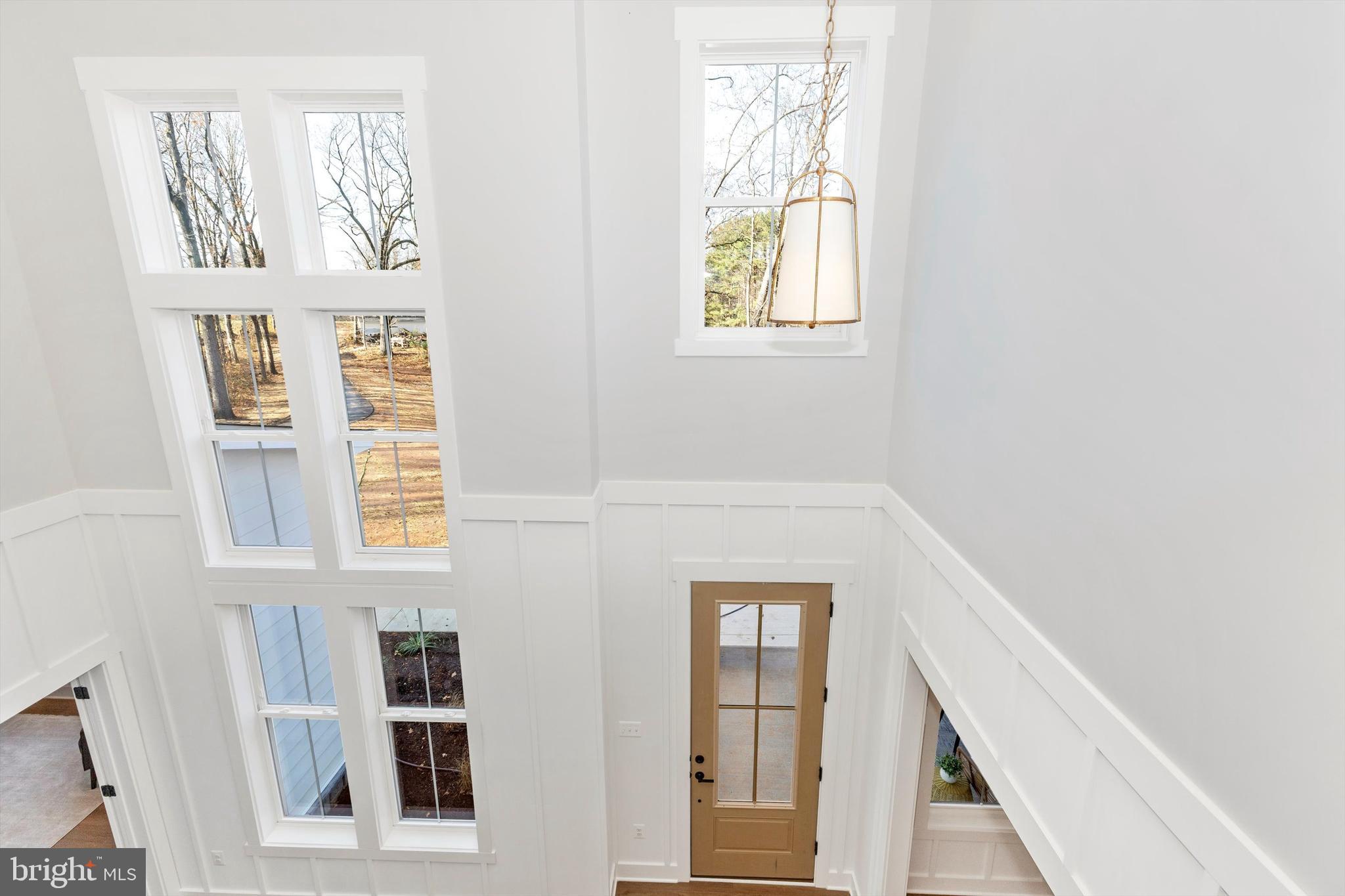 1199 Hoods Mill Road Cooksville, MD 21723 - Photo 37 of 86 a view of an entryway with wooden floor and front door