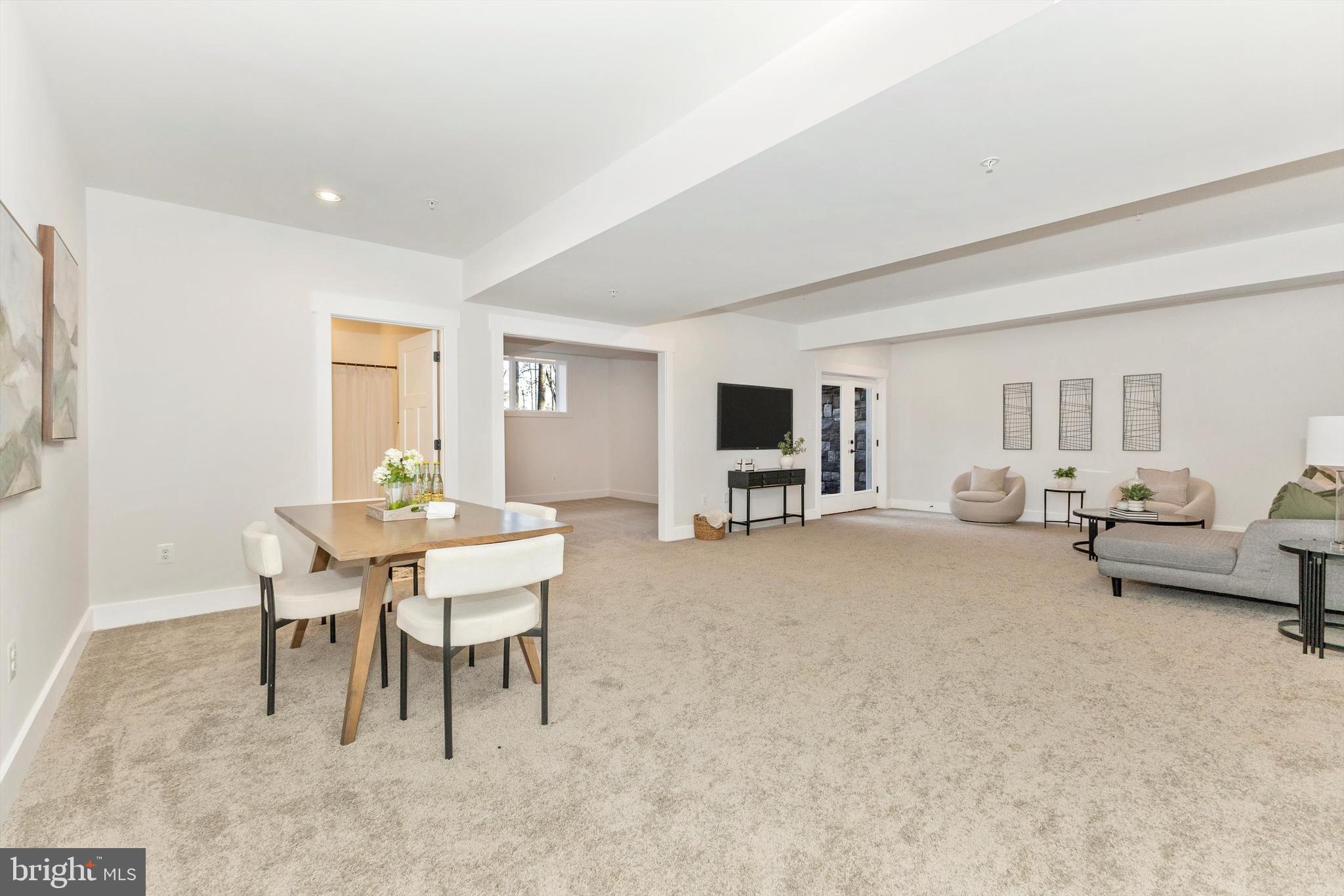 1199 Hoods Mill Road Cooksville, MD 21723 - Photo 48 of 86 a living room with furniture and a flat screen tv