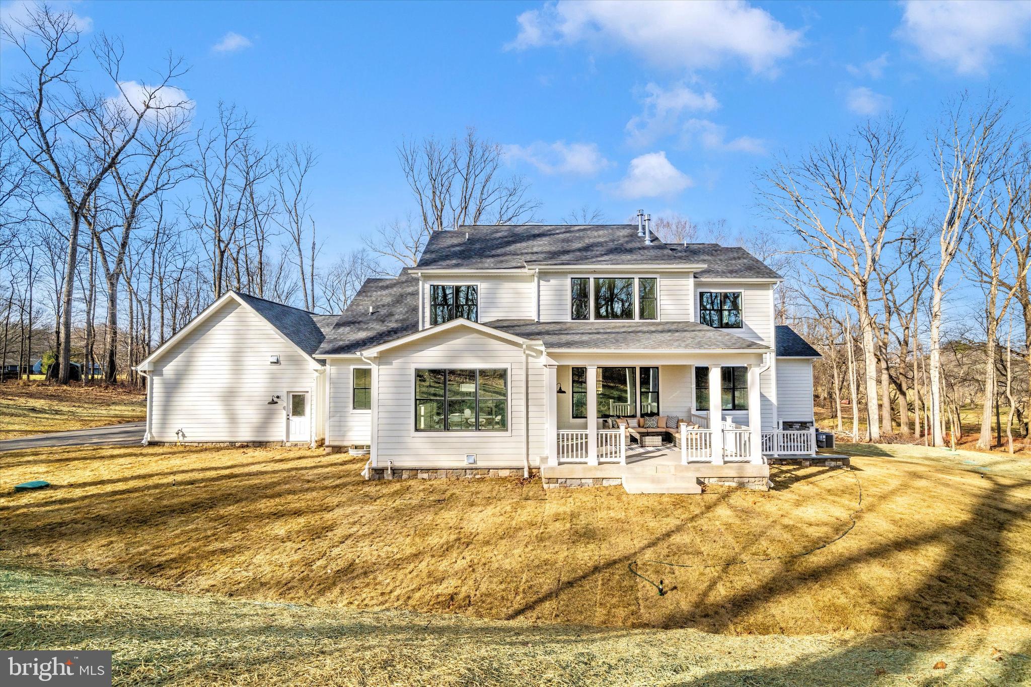1199 Hoods Mill Road Cooksville, MD 21723 - Photo 66 of 86 a front view of a house with a yard