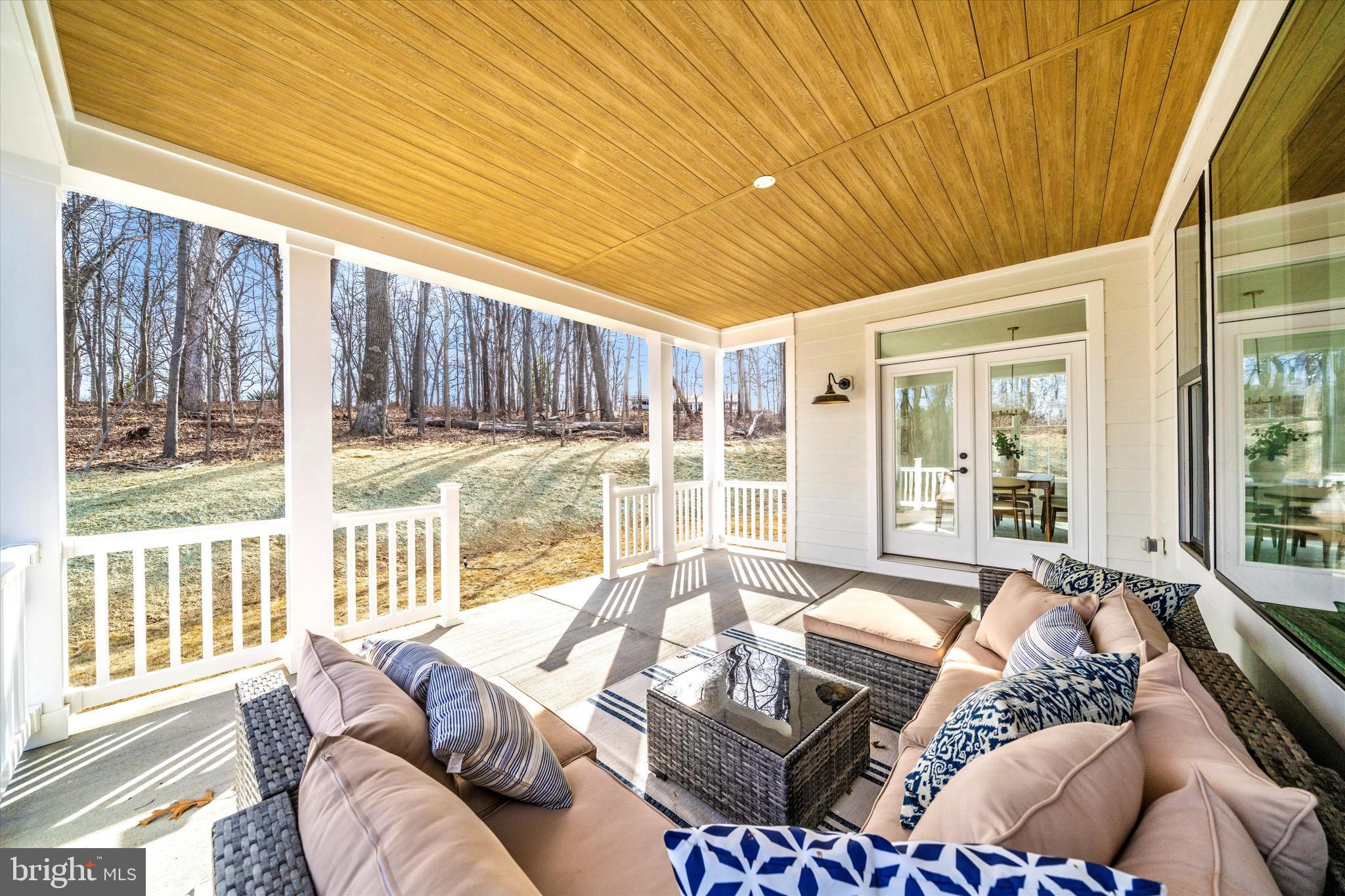 1199 Hoods Mill Road Cooksville, MD 21723 - Photo 68 of 86 a living room with furniture and a large window