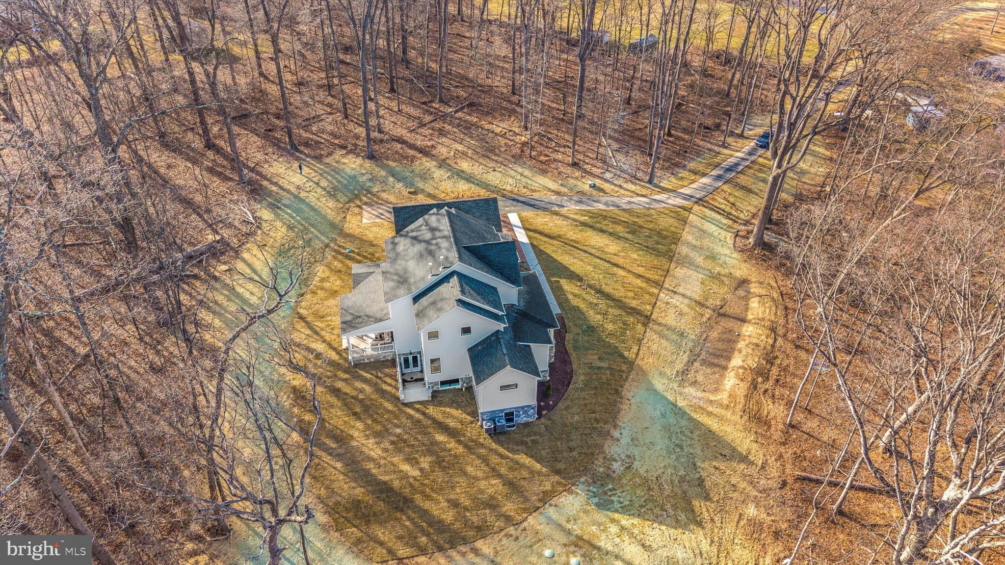 1199 Hoods Mill Road Cooksville, MD 21723 - Photo 77 of 86 a front view of a house with a yard