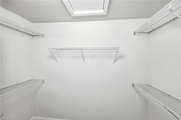 a view of a room with racks on the wall