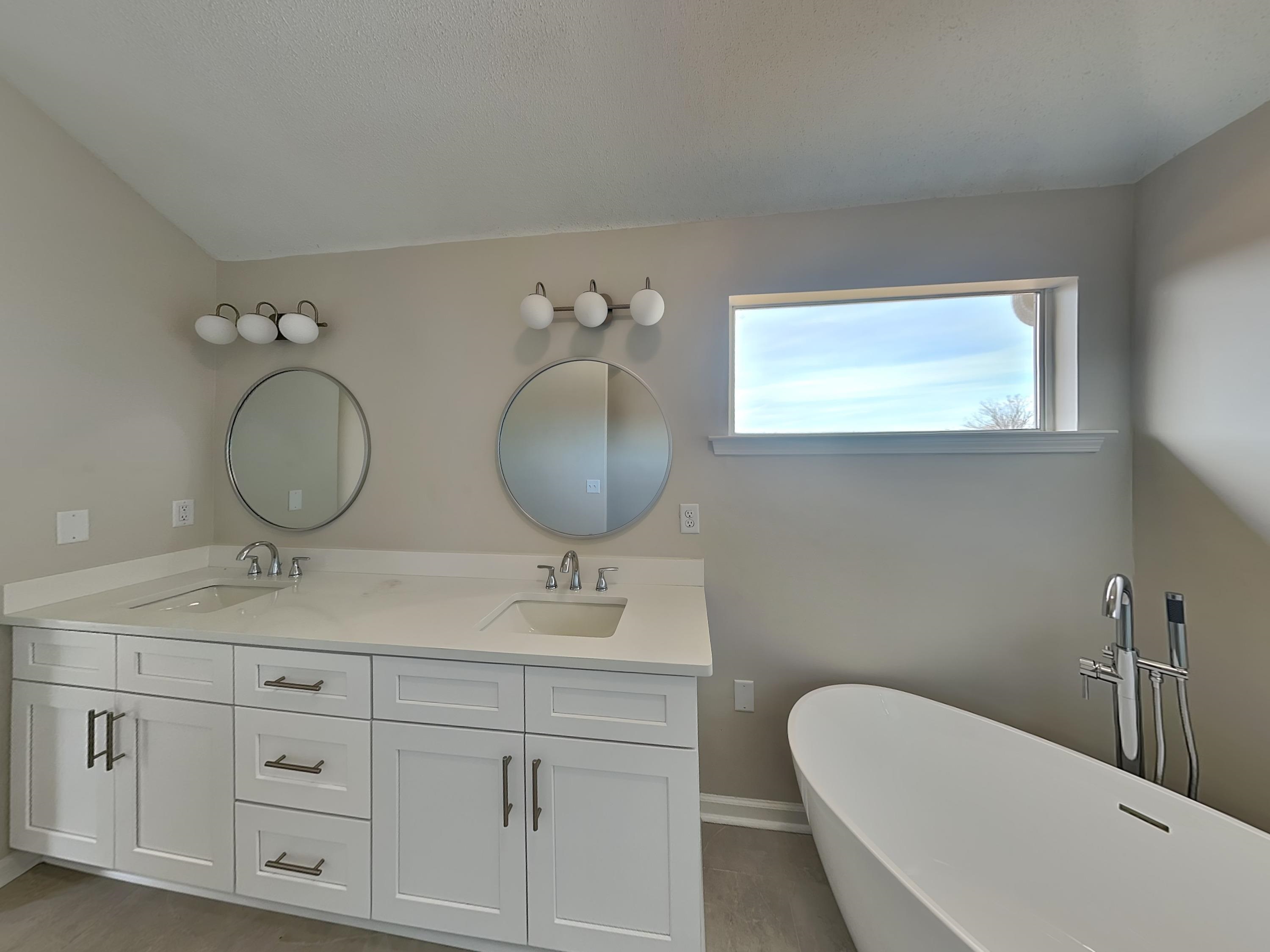 7902 Pinefrost Lane Memphis, TN 38125 - Photo 10 of 18 a bathroom with a toilet a sink and mirror