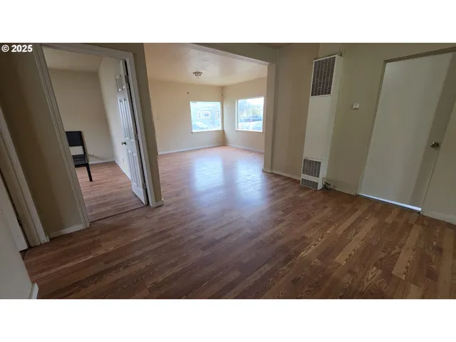 a black and white photo of a house