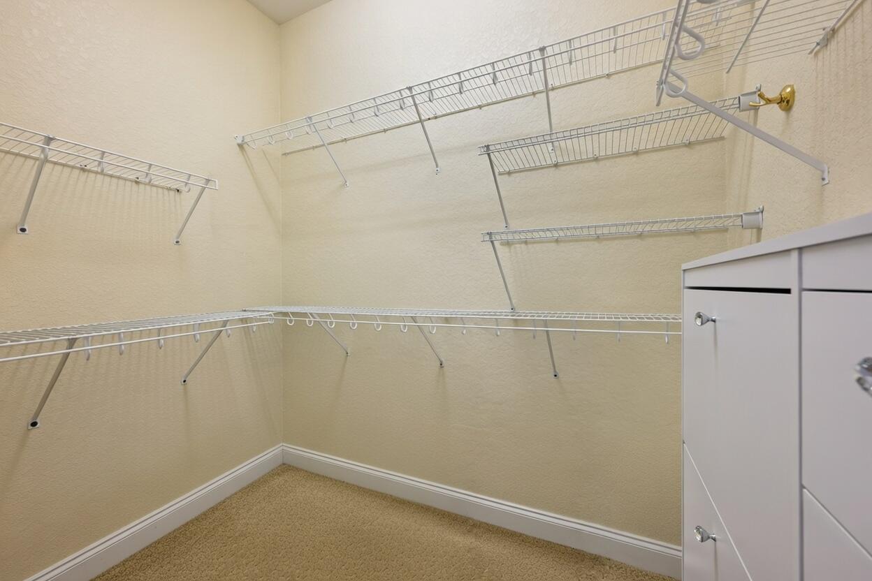 2615 Masters Boulevard Navarre, FL 32566 - Photo 22 of 51 a view of a room with racks on the wall