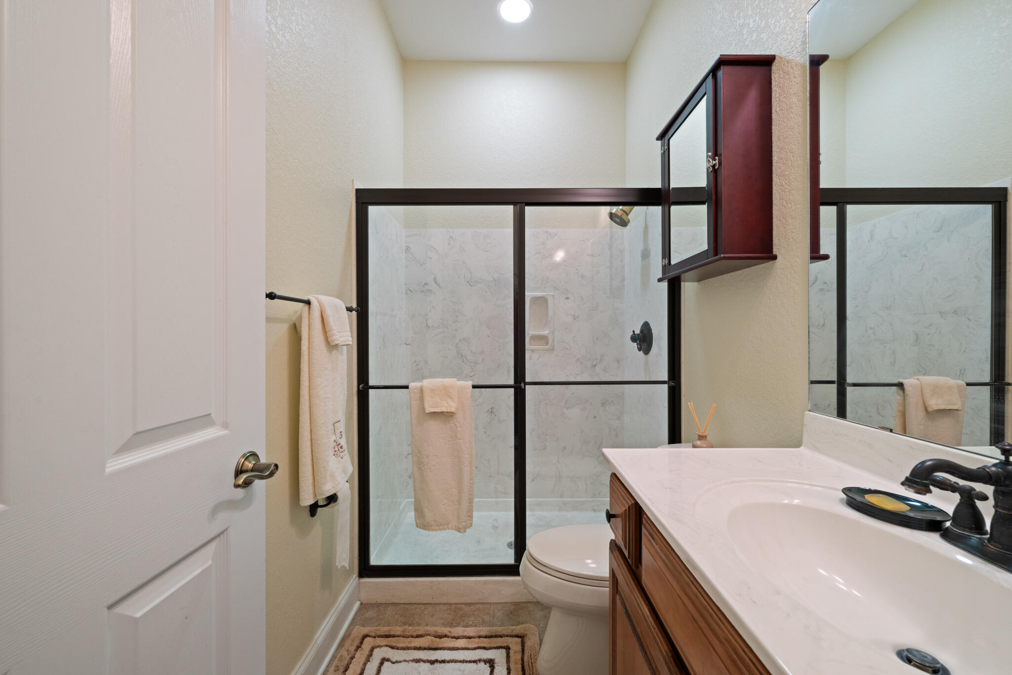 2615 Masters Boulevard Navarre, FL 32566 - Photo 38 of 51 a bathroom with a sink and a mirror