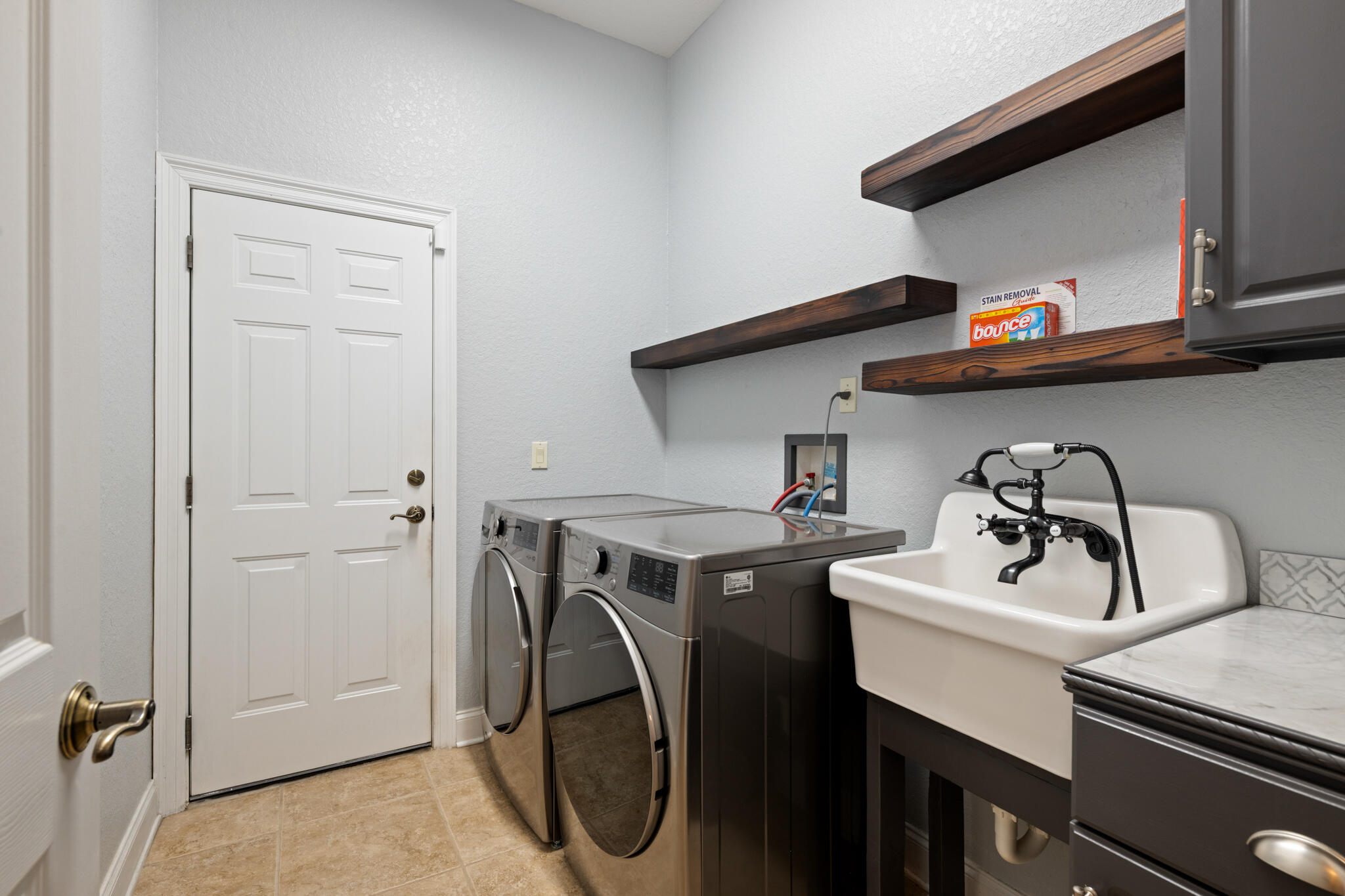 2615 Masters Boulevard Navarre, FL 32566 - Photo 40 of 51 a utility room with dryer and washer