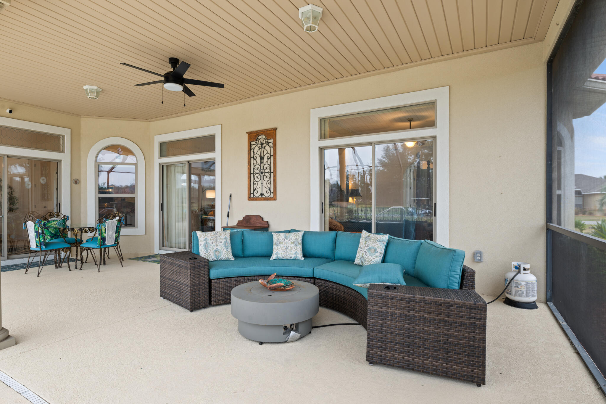 2615 Masters Boulevard Navarre, FL 32566 - Photo 43 of 51 a living room with furniture and a large window