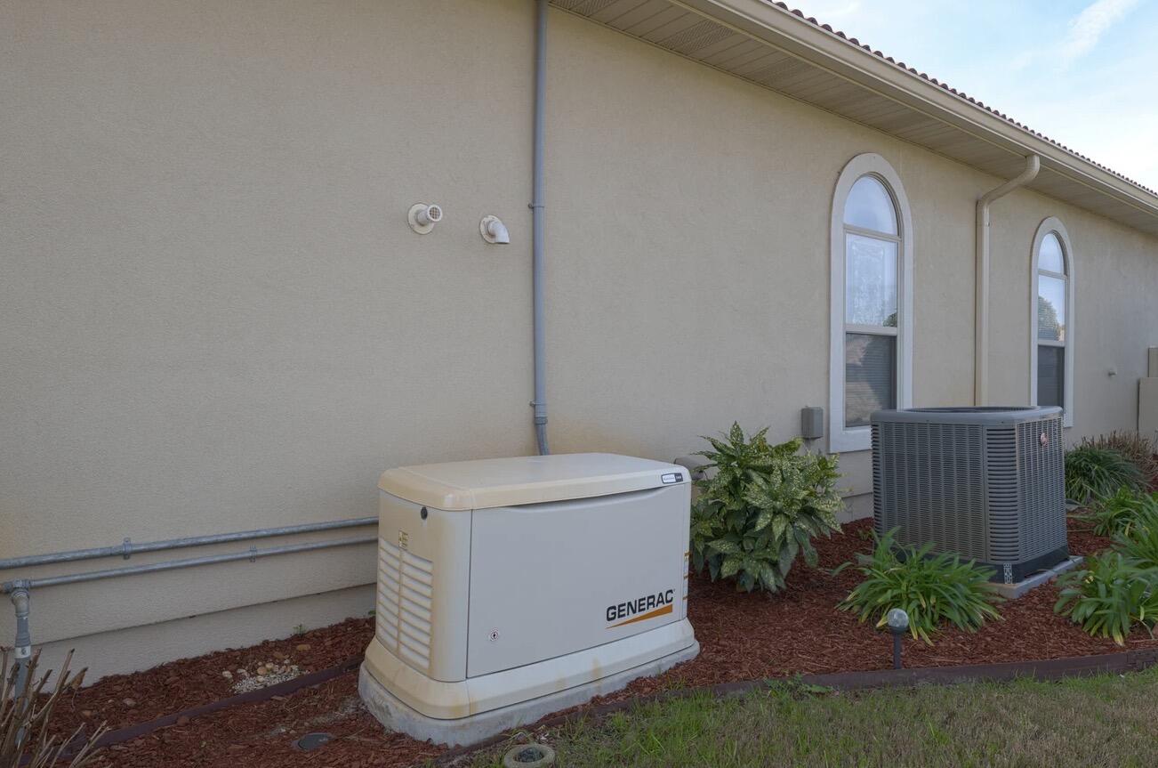 2615 Masters Boulevard Navarre, FL 32566 - Photo 5 of 51 a view of front door and porch