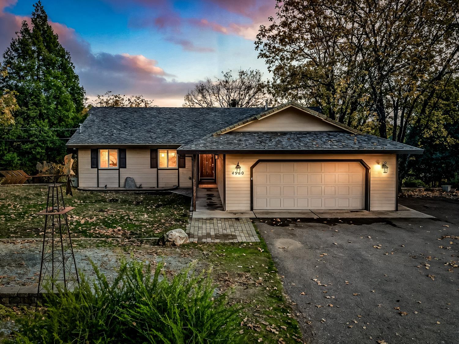 a backyard of a house with lots of green space