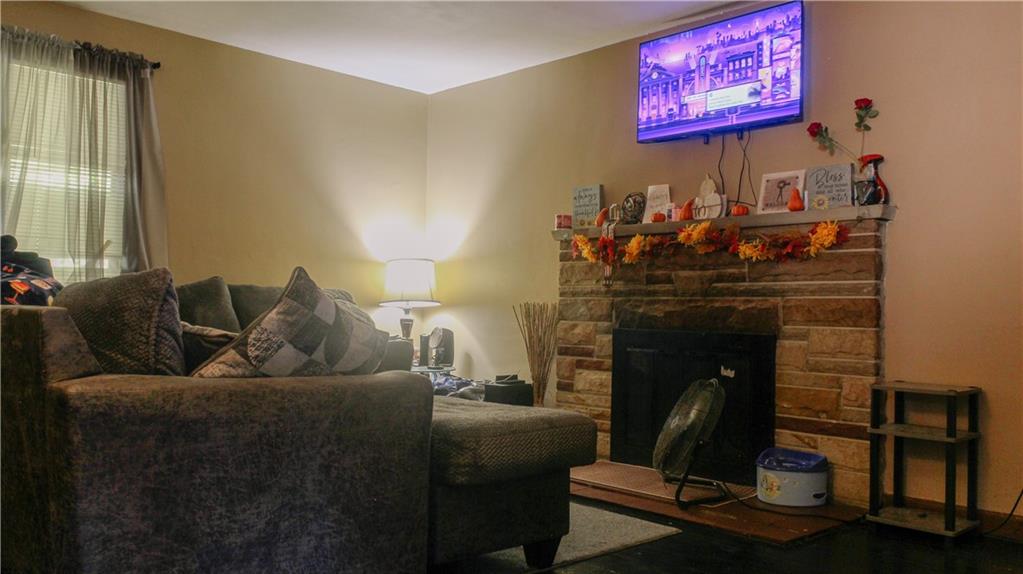 1638 Shady Drive Farrell, PA 16121 - Photo 5 of 21 a living room with furniture and a fireplace